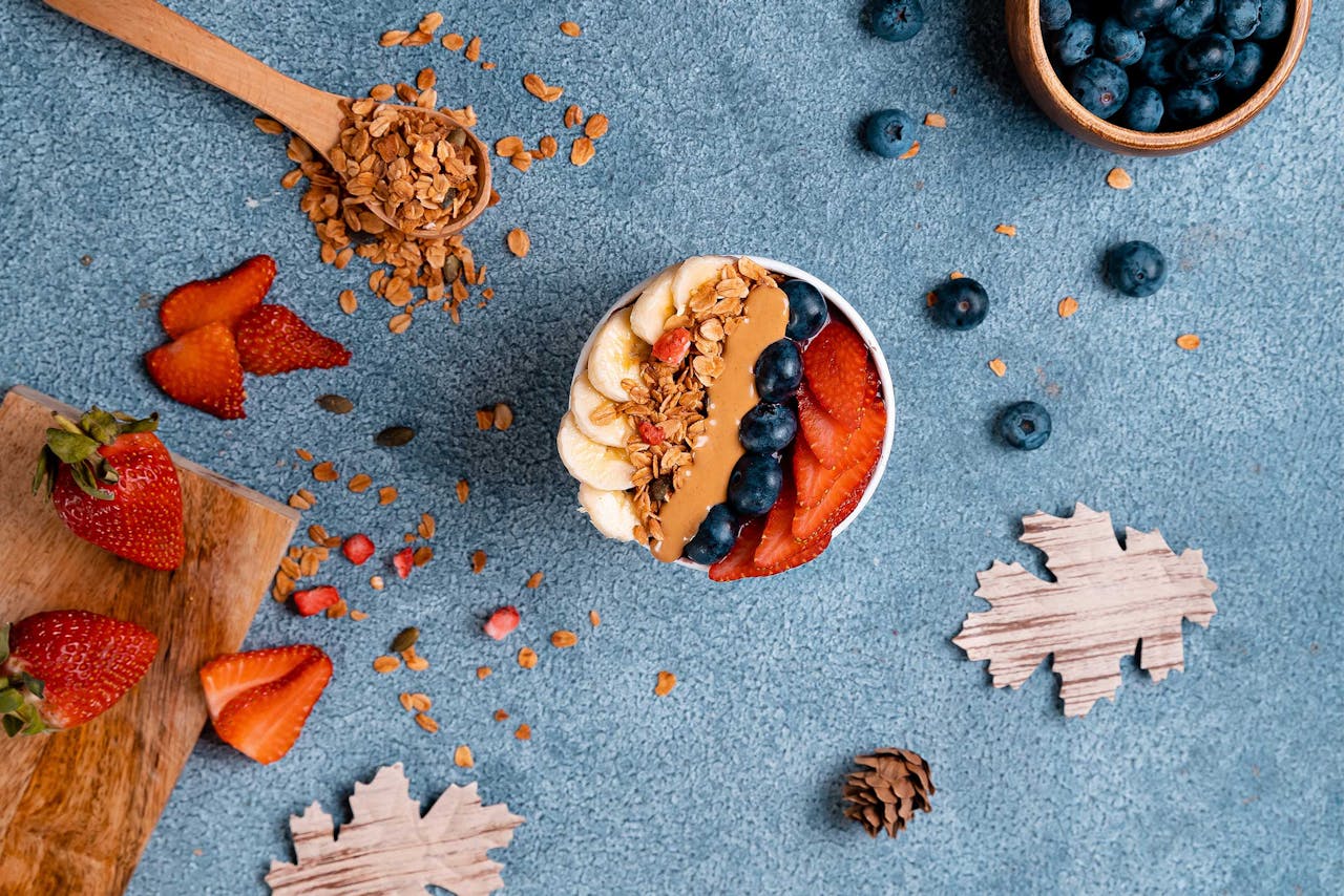 Berry Yogurt Parfait Layered with Crunchy Granola Topping